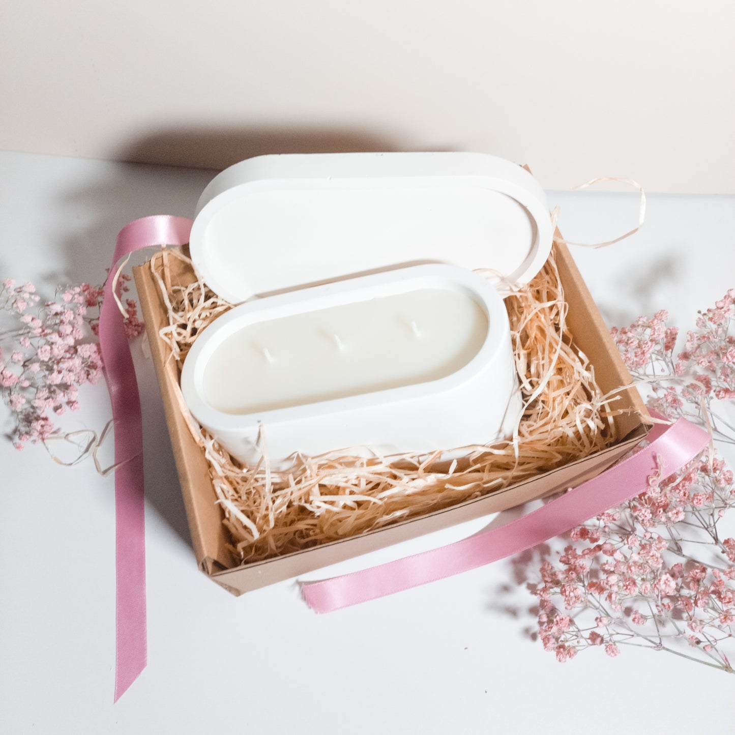 Large white candle with matching tray in gift box with ribbon