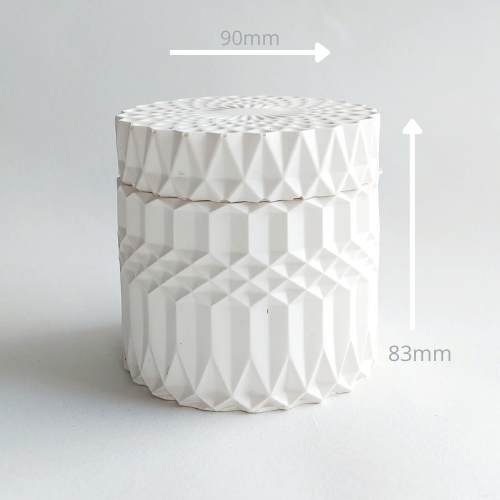 White candle with lid in cocoa butter vanilla candle scent